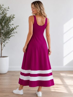 Dolga ženska poletna obleka brez rokavov s kontrastnimi črtami na spodnjem delu. Udobna maxi obleka za poletne dni in sproščeno eleganco, na voljo v velikostih od 36 do 48.